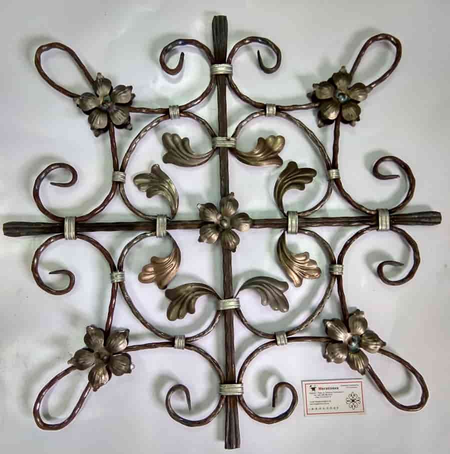 Розетка кована